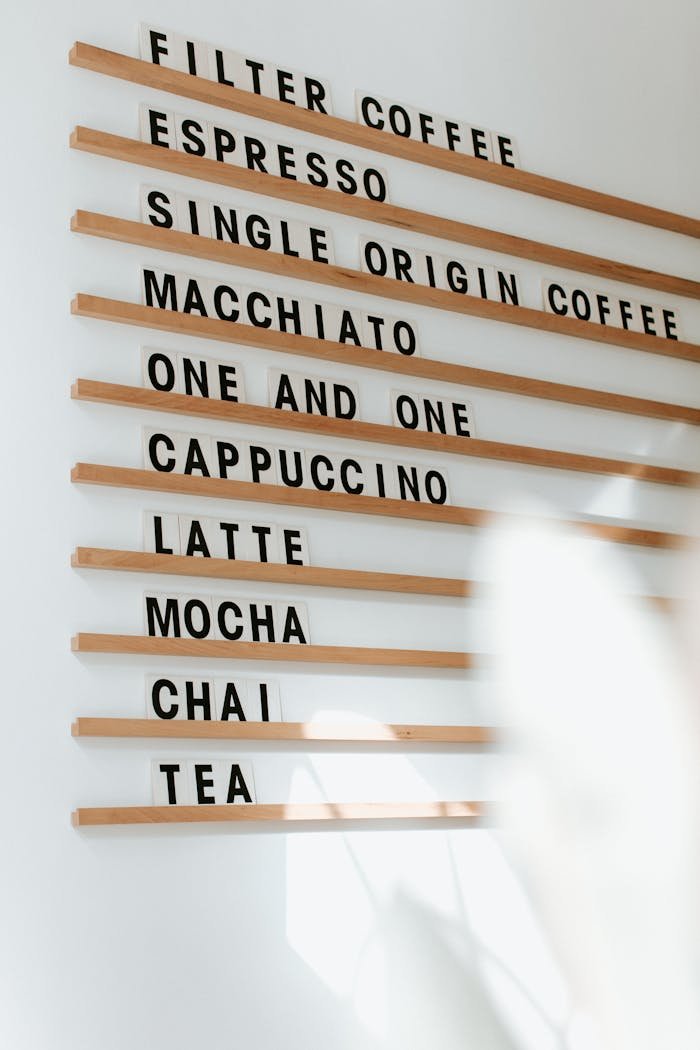 Stylish menu board displaying various coffee types at a café in Lancaster, PA.